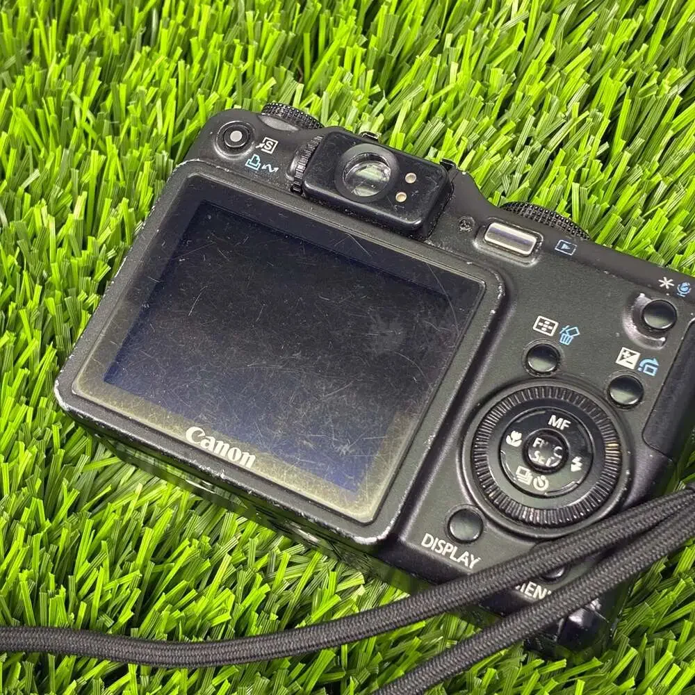 Canon PowerShot G7 10.0MP Digital Camera with Charger, Battery, and 4GB SD Card